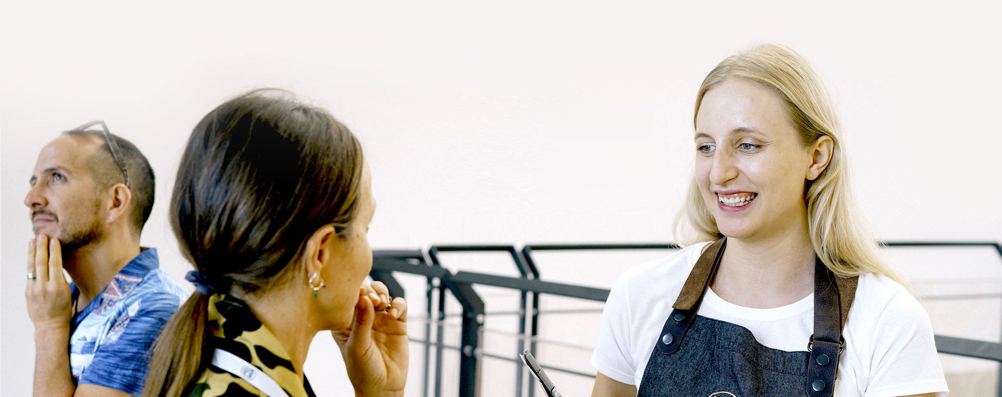 Young Ambassadors talking with visitor